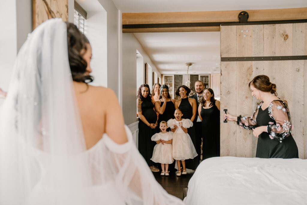 Bridesmaids first look with bride