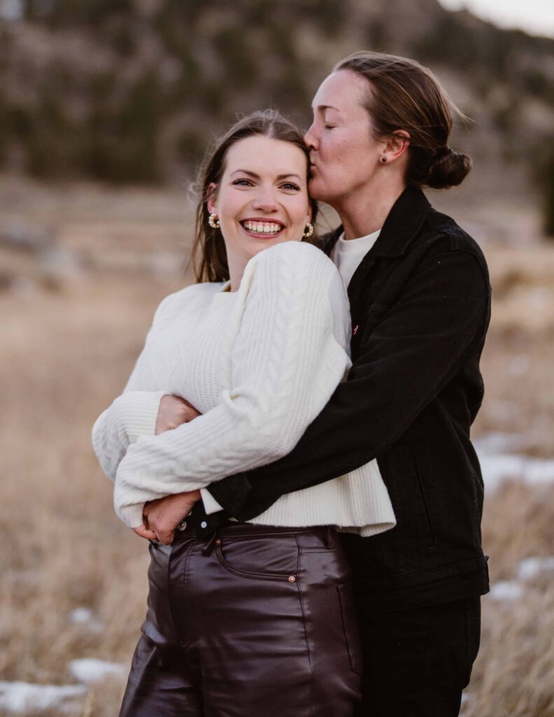 Lesbian couple has their foreheads together for a cute photo session 